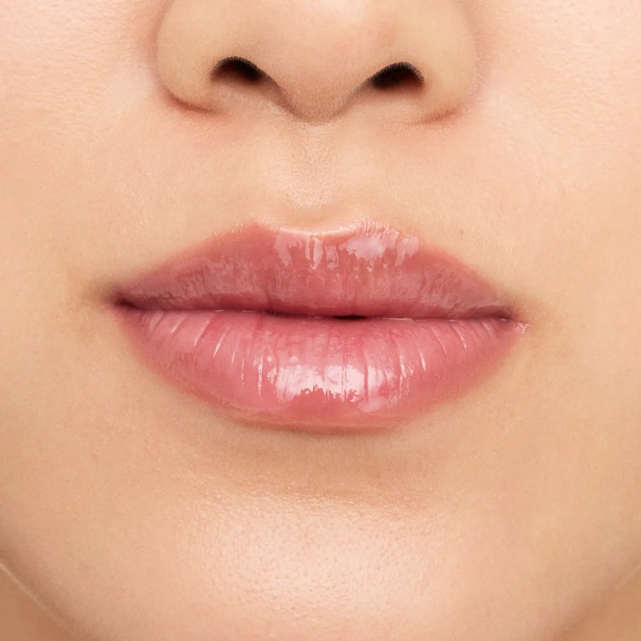The Super Peptide Glossy Lip + Pouch Set